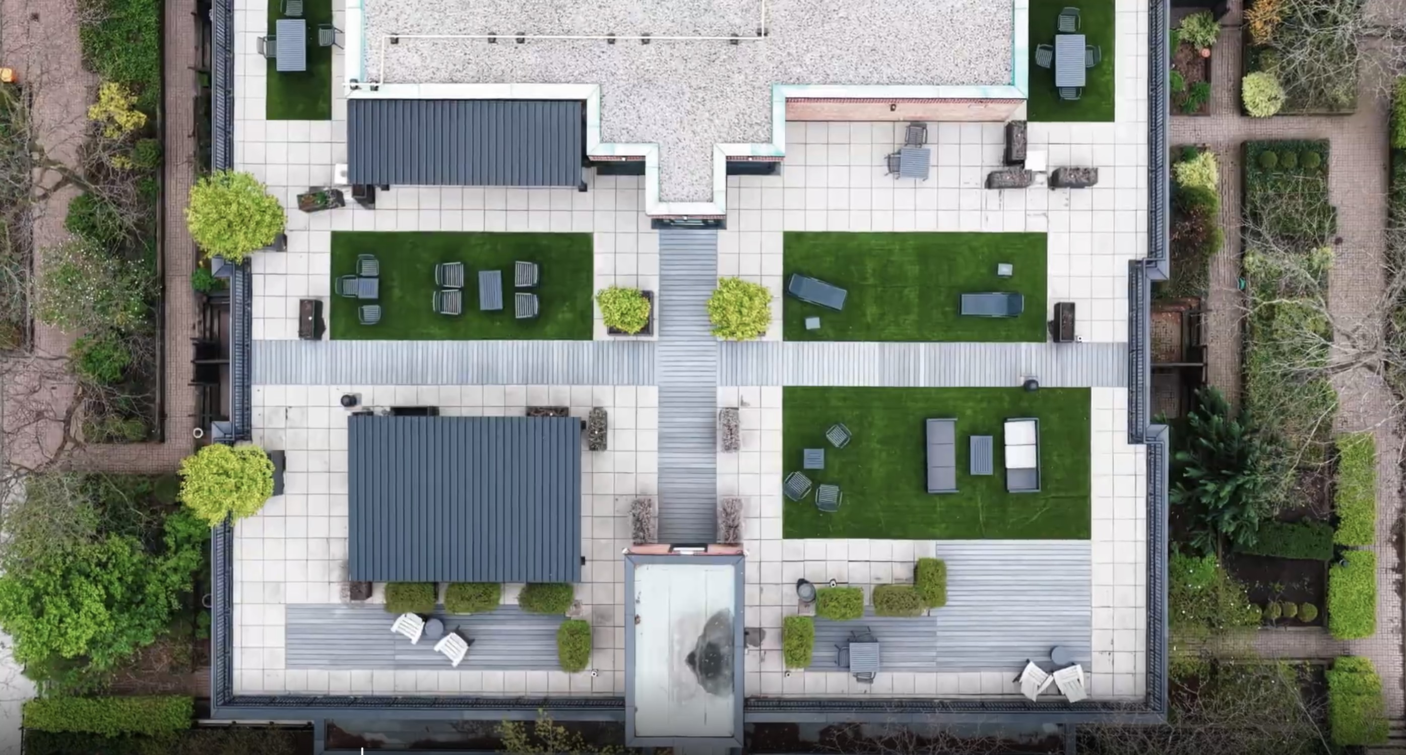 Rooftop terrace gardens and lounge areas at 225 Davenport Road